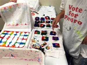 Saturday Explorer working on art project 