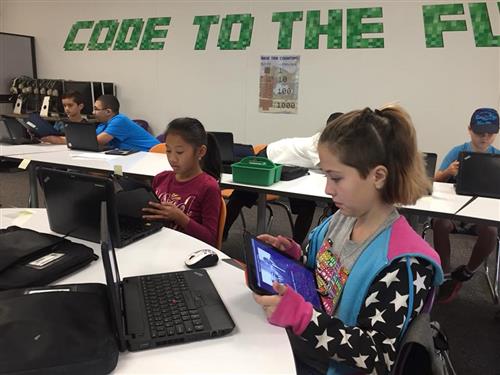 Students working on Computer Science projects 